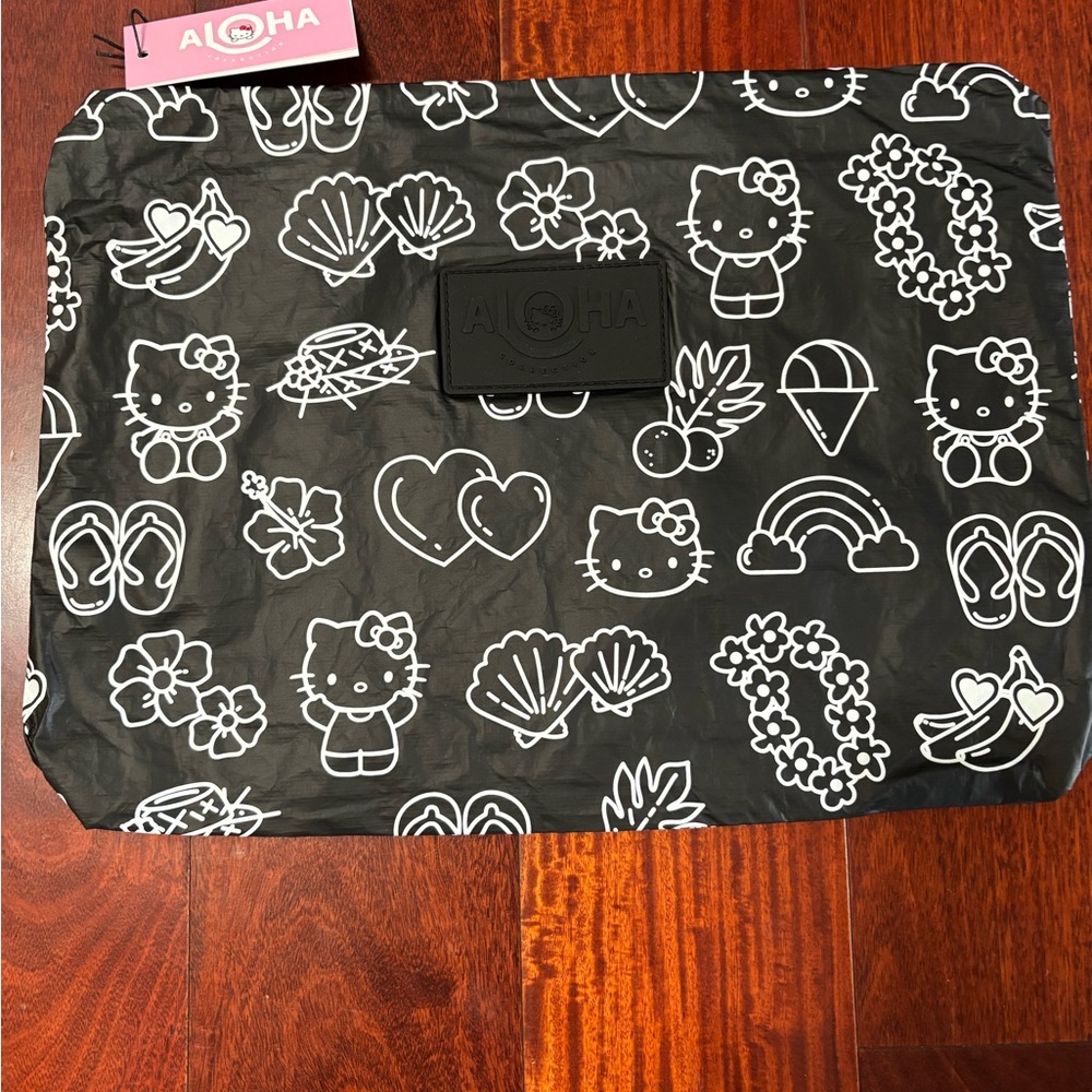 ALOHA Collection x Hello Kitty Max Pouch - brand new in poly bag. Sold out